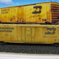 Weathered MTL BN 50ft Plug Door boxcar + the proto pic I used as a reference