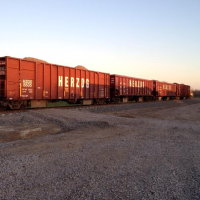 A cut of gons filled with ballast were parked on the NWP track near where I work in Petaluma, Ca.
