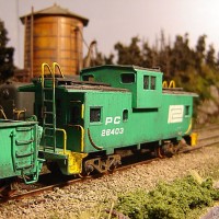Penn Central Passing PC Caboose 26403